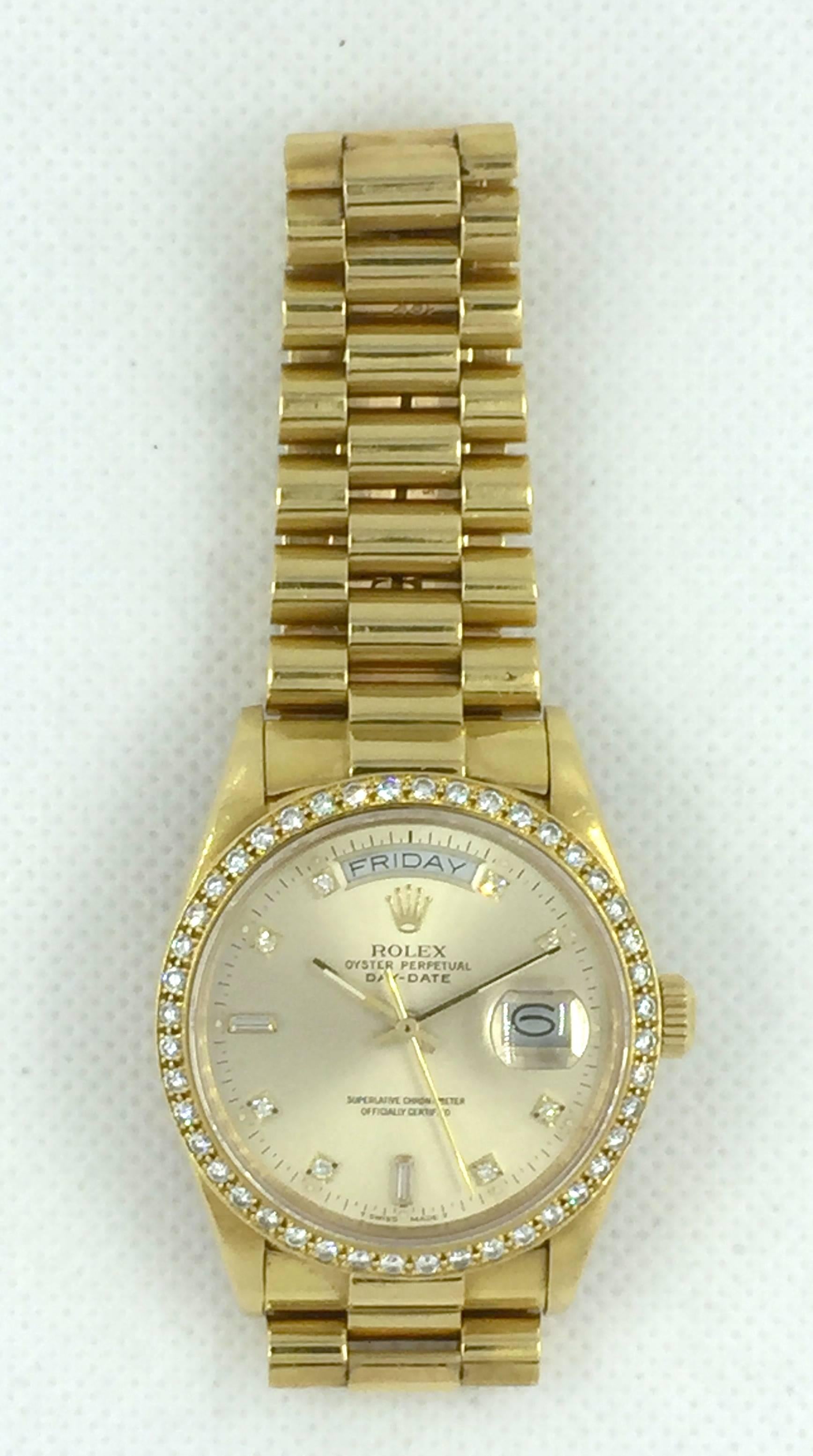 Rolex 18K Yellow Gold Oyster Perpetual Day-Date Wristwatch
Factory Champagne Diamond Dial
Factory 18K Yellow Gold and Diamond Bezel
36mm in size 
Reference 18048 Which is For A Factory Diamond Bezel
Rolex Calibre 3055 Automatic Quickset