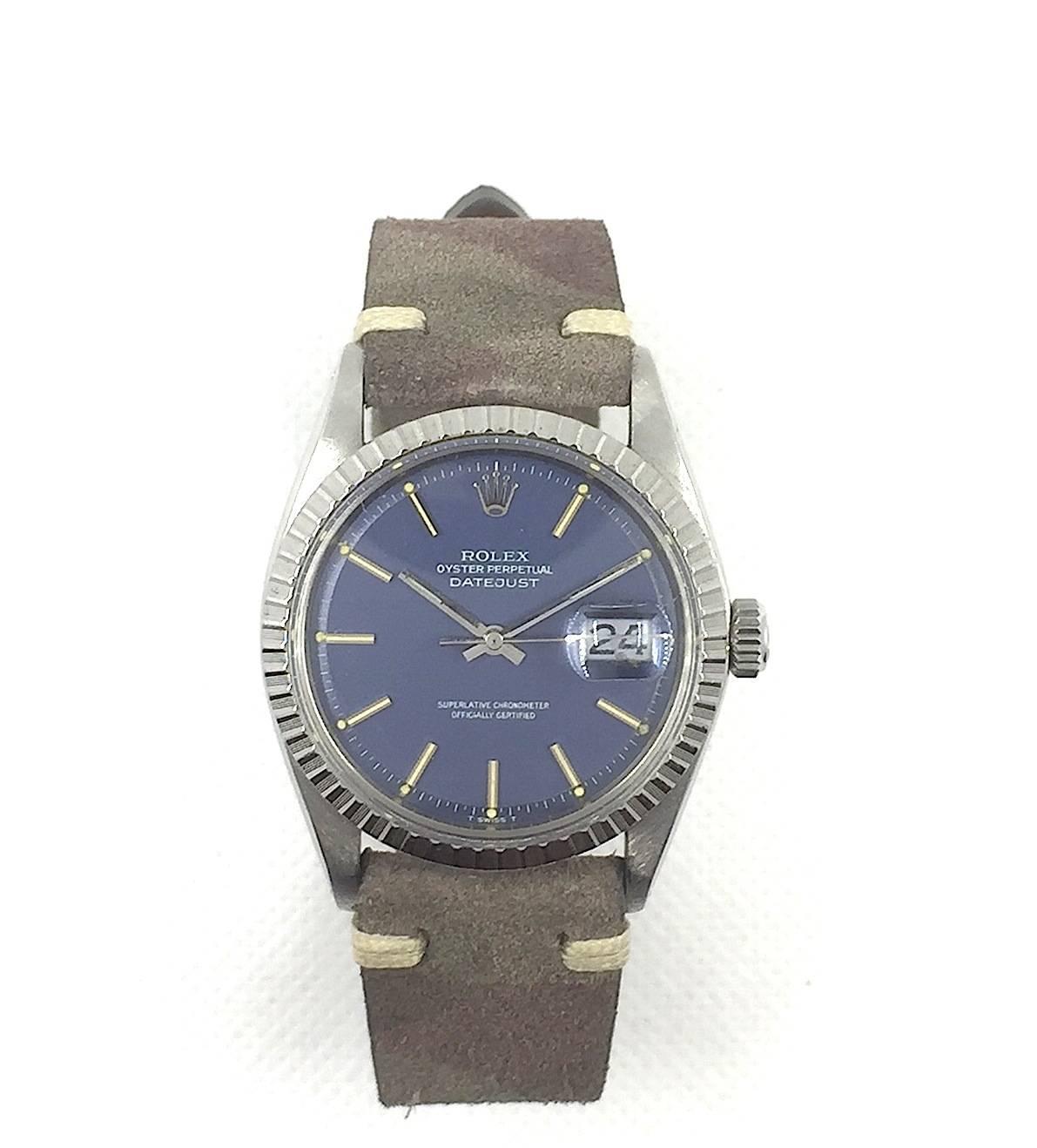 Rolex Stainless Steel Oyster Perpetual Datejust Wristwatch
Factory Blue Matte Dial with Applied Silver Stick Hour Markers
Stainless Steel Engine-Turned Bezel
36mm in size 
Rolex Calibre Base 1500 Base Automatic Non-QuickSet Movement
Acrylic