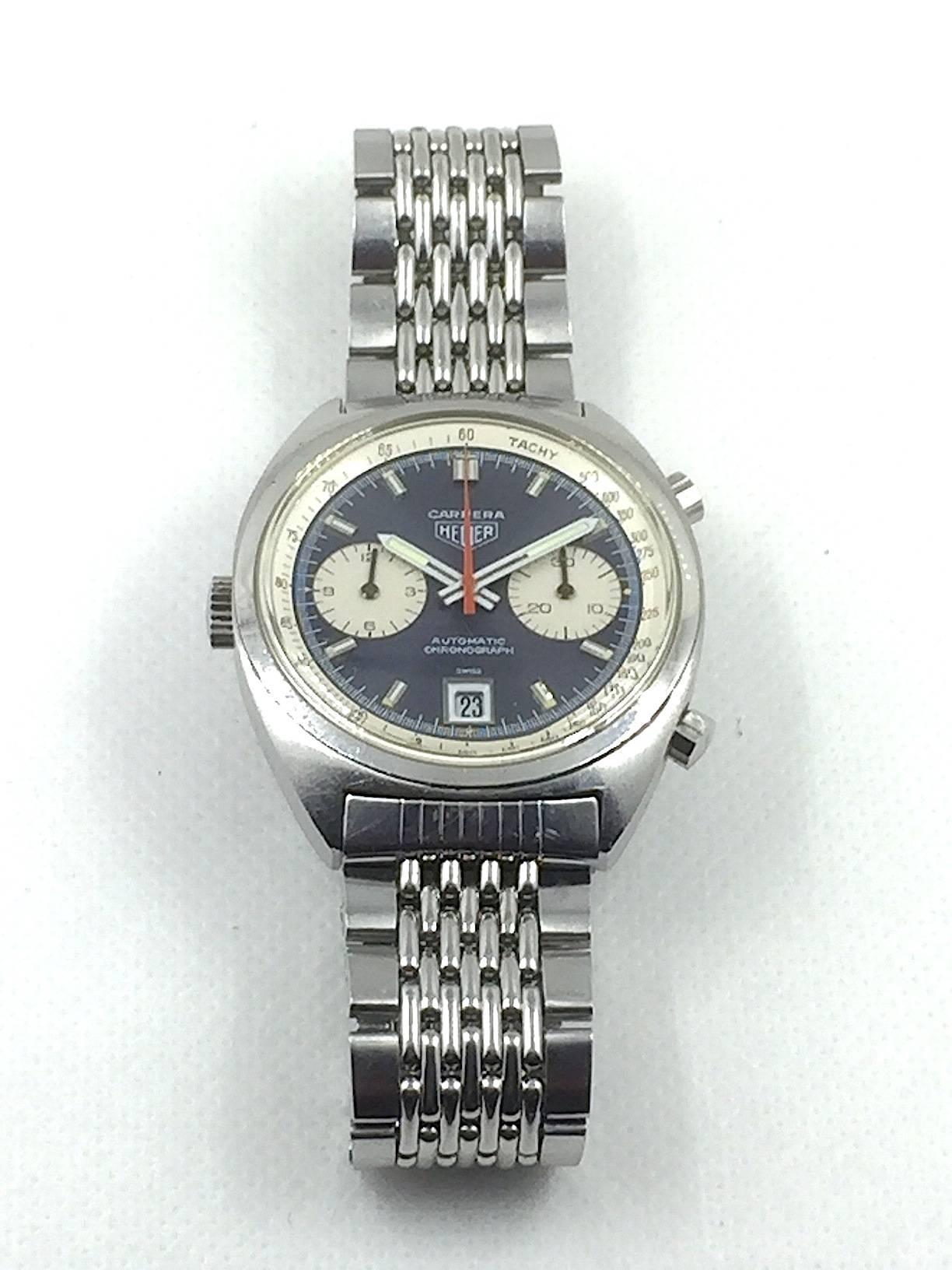 1970s Heuer Carrera Automatic Chronograph Reference 1153 Wristwatch
Year: Early 1970s
Stainless Steel Case
Reference 1153
Chronograph Function with Flyback
Heuer Signature Crown on Left Side of Case
Dimensions: 38mm diameter; 9mm Thick
Designed for