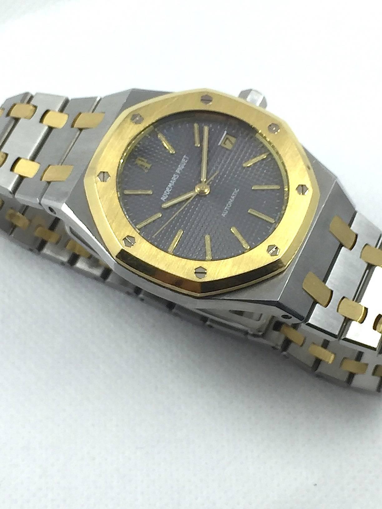 Audemars Piguet Steel and Gold Royal Oak Automatic Wristwatch, 1980s In Excellent Condition In New York, NY