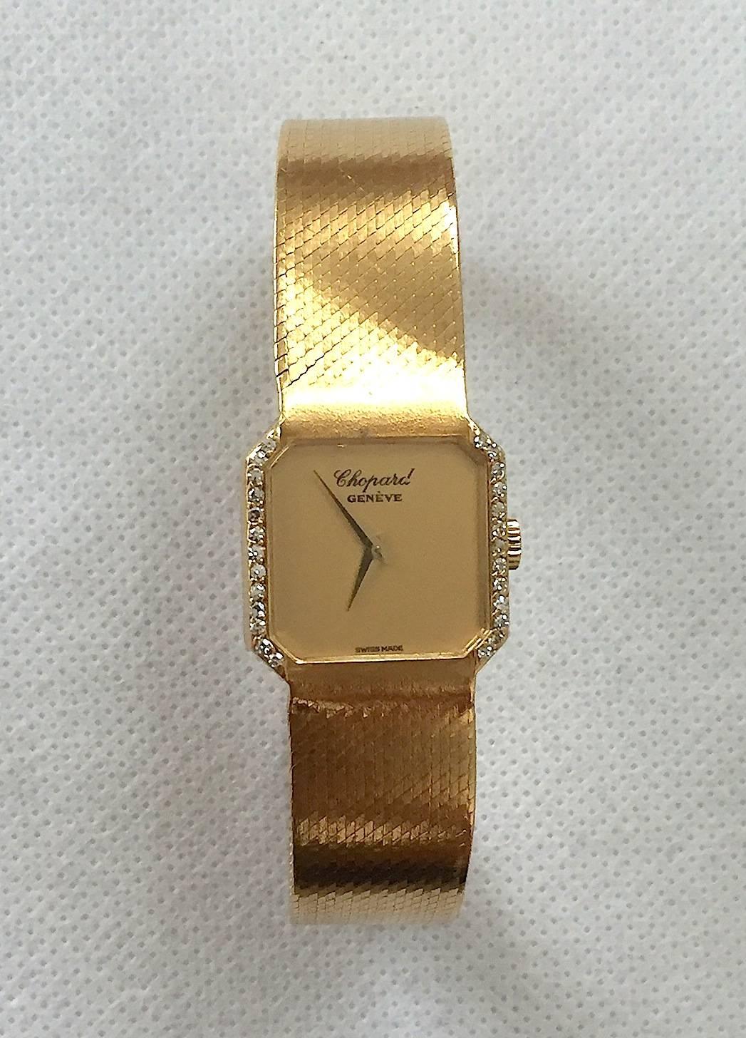 Ladies 18K Yellow Gold Chopard Wristwatch
Manual Wind Movement 
Diamond Bezel
LUC (Chopard)Signed Crown
Champagne Chopard Geneve Dial
Hour and Minute Functions
18K Yellow Gold Integrated Bracelet with Chopard Signature Logo and Diamond on