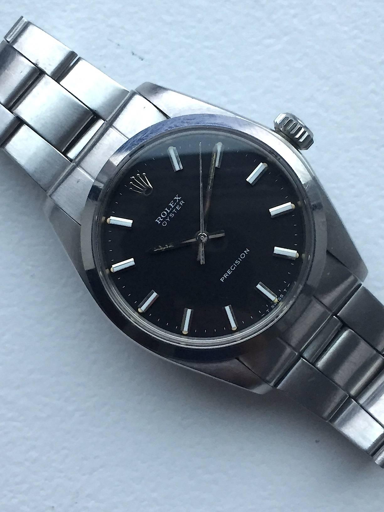 Rolex Stainless Steel Oyster Precision Black Dial Manual Wind Wristwatch, 1970s In Excellent Condition In New York, NY