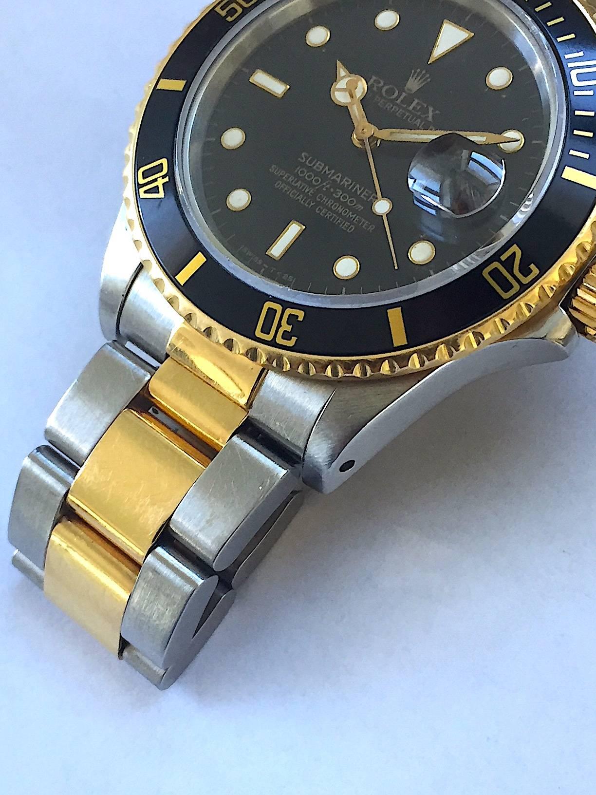 Women's or Men's Rolex Steel and Gold Submariner Wristwatch, 1980s Box and Papers For Sale