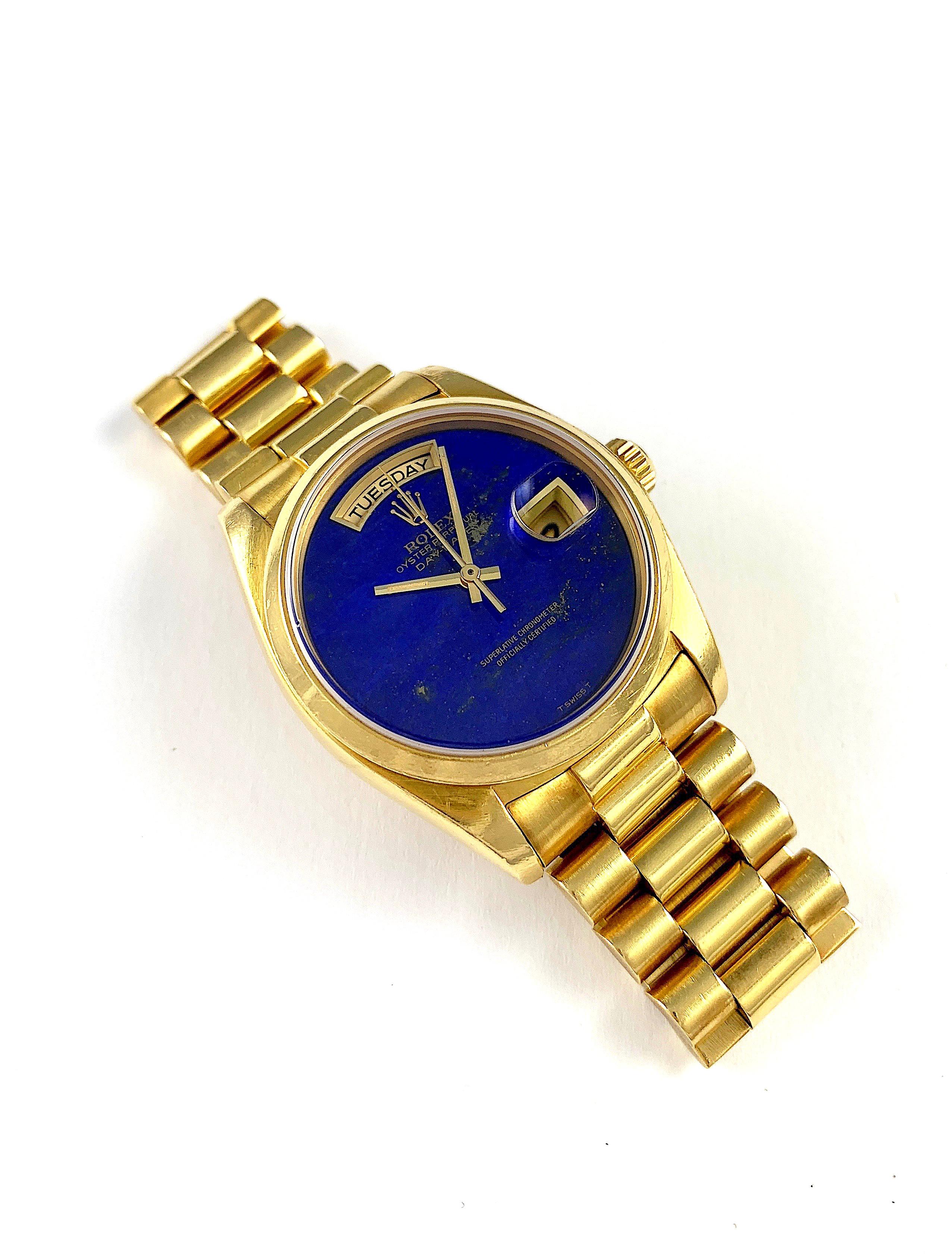 Rolex 18K Yellow Gold Day-Date Presidential Watch
Rare Factory Rolex Lapis Lazuli Dial Without Hour Markers
Lapis Is One Of The Rarest Rolex Stone Dials Produced
The Dial Has a Small Crack Seen with A Loupe and Under Magnification at Eleven O'clock
