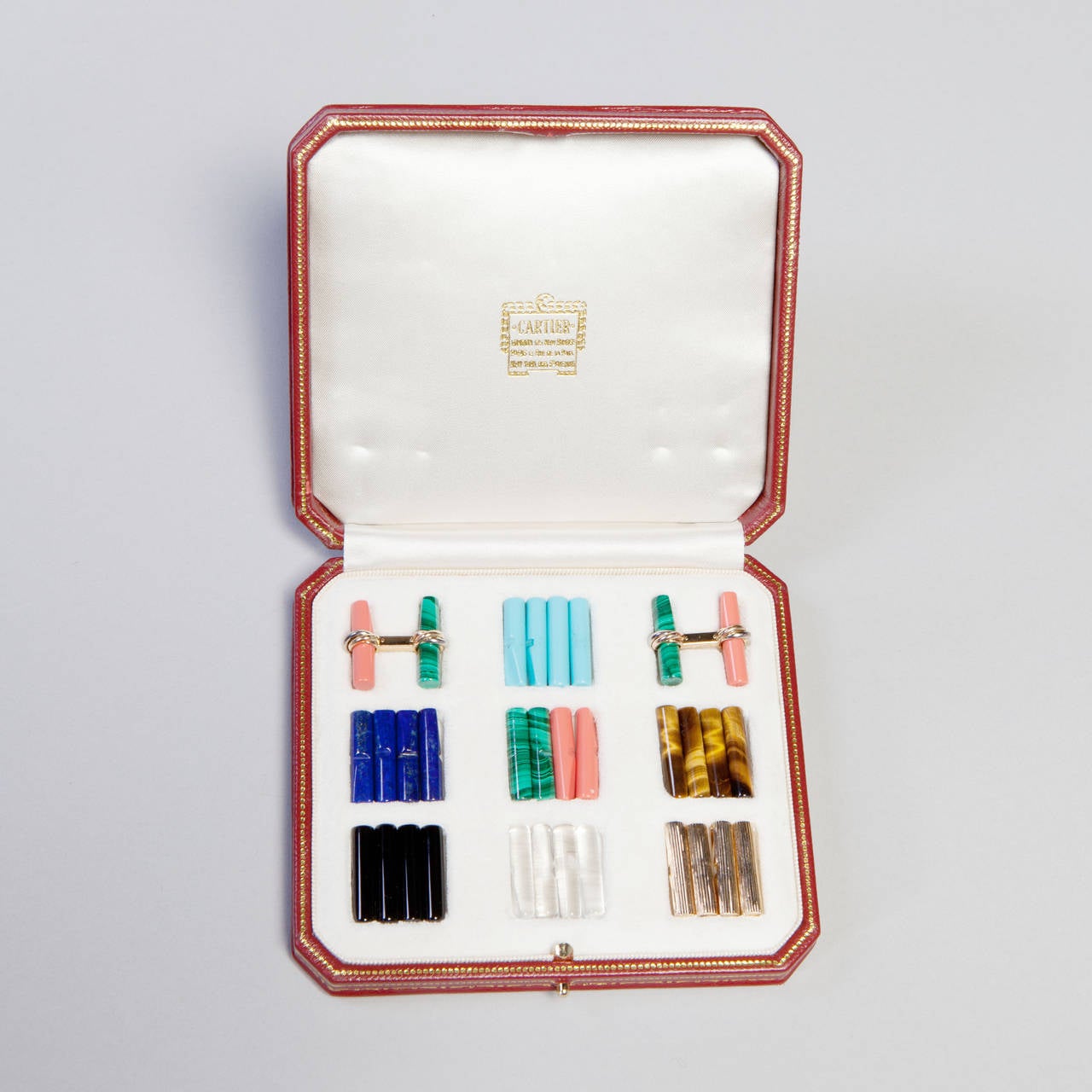 Modern Cartier gem set gold cufflinks For Sale