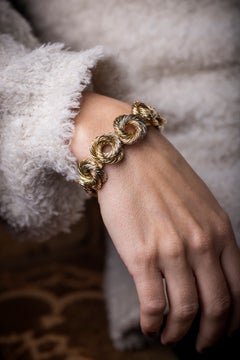 Carlo Weingrill: "love knot" circular three tone 18 karat gold bracelet