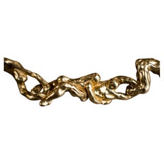 1970s sculptural erotic French 18 karat gold necklace and bracelet suite
