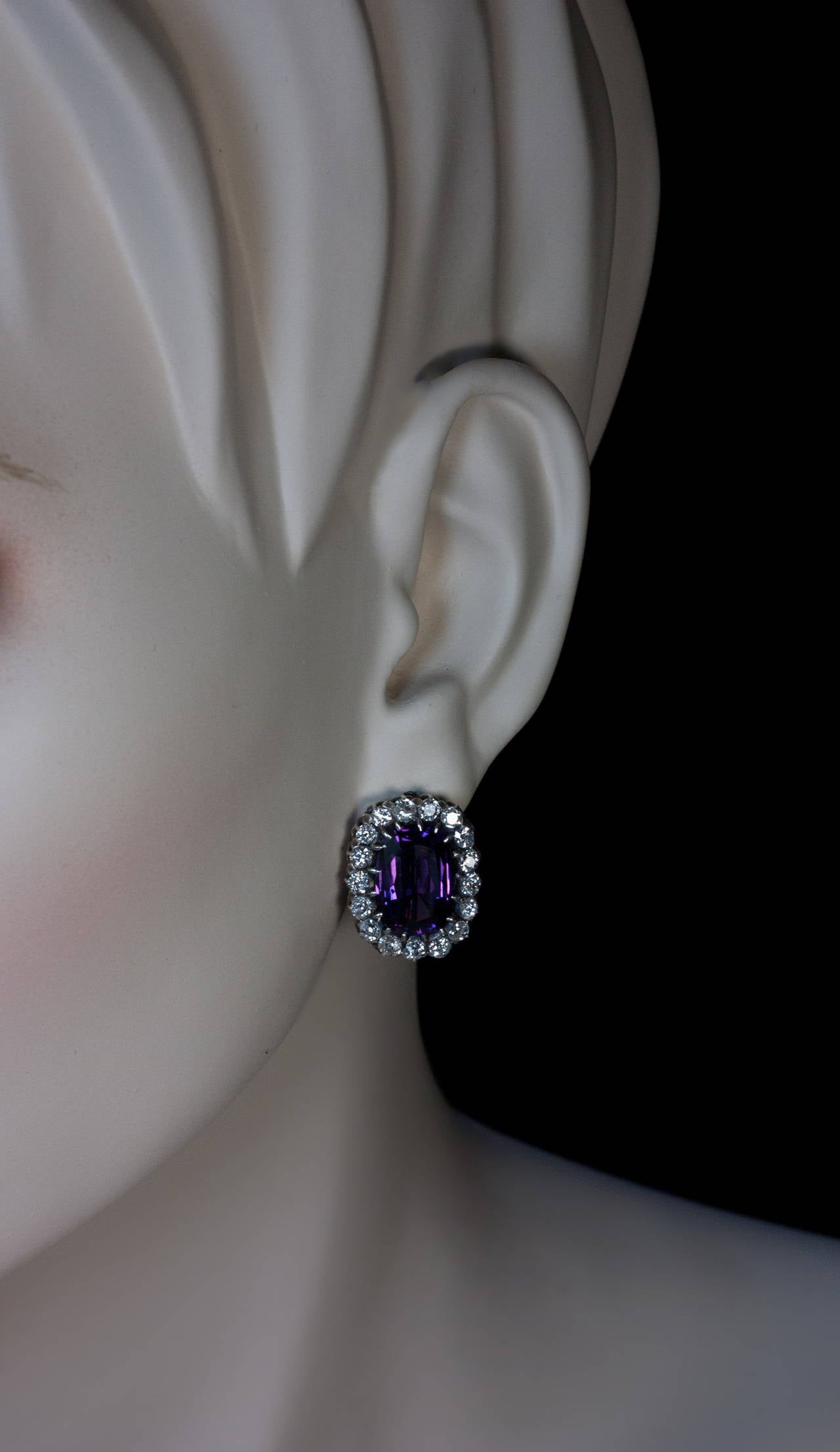 Made in Odessa between 1908 and 1917

The silver topped 14K gold earrings are set with two large cushion cut amethysts:

Approximately 5.40 ct each / 10.80 ct total weight,

Surrounded by sparkling bright white old cut diamonds (estimated