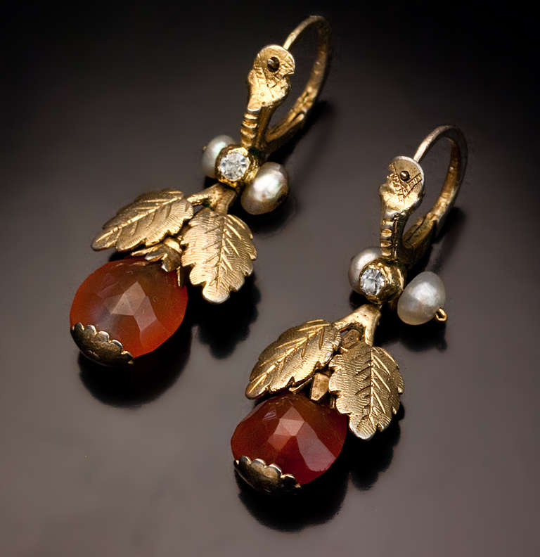 A pair of Russian gilded silver, faceted amber, paste and fresh water pearl pendant earrings made in the last quarter of the 18th century

length 38 mm (1 1/2 in.)