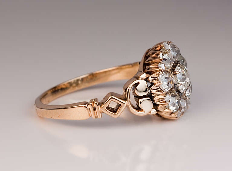 Moscow, circa 1885

a 14K gold ring is set with 8 old cushion cut diamonds and 7 rose cut diamonds, estimated total diamond weight 1.75 ct.

marked with maker's initials and 56 zolotnik gold standard

ring size 7 1/2