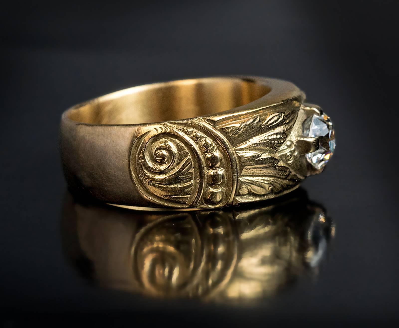 Russian, 1910s

14K gold ring chased and engraved with stylized floral designs in Russian Modern style of the 1910s, set with an antique cushion cut diamond (5.5 x 5.1 x 4 mm, approximately 0.95 ct, F color, VS1 clarity)

width 9 mm (3/8