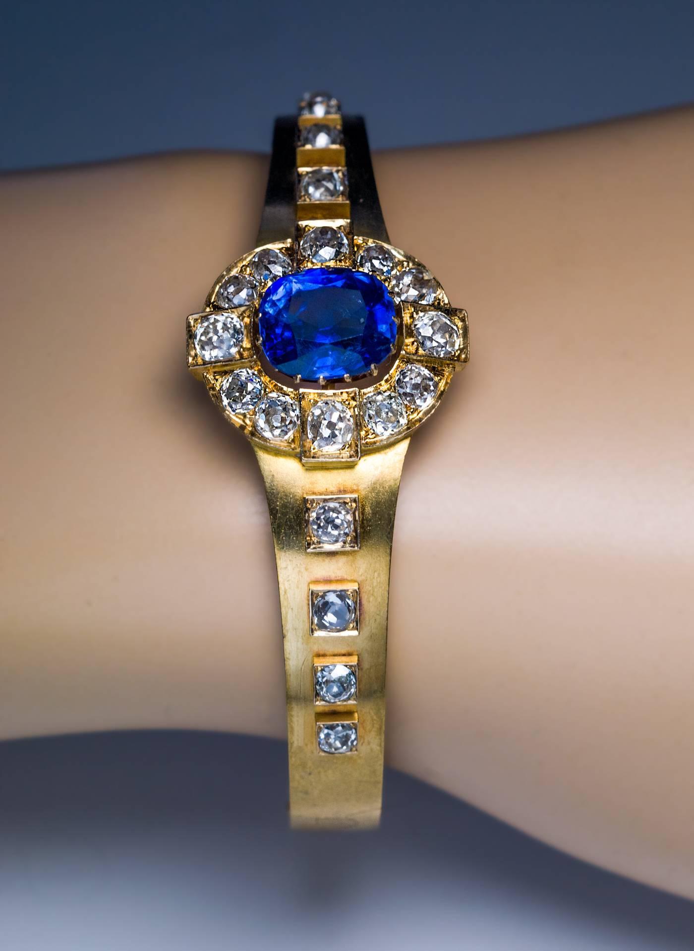 French, circa 1890

A very fine Victorian era 18K matte gold bangle bracelet features a natural unheated 4.82 ct Burma sapphire (10.64 x 9.34 x 5.42 mm) 

The bracelet is further embellished with 20 antique cut diamonds.

Estimated total