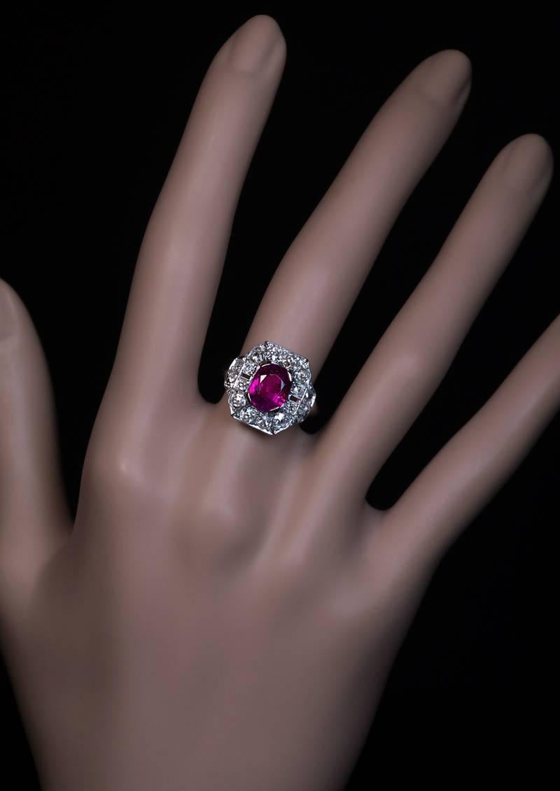 Circa 1925

An Art Deco platinum (top) and white gold (shank) vintage engagement ring features a very fine natural non-heated Burma (Myanmar) ruby surrounded by old mine cut diamonds.

The ring comes with AGL gemstone report for the ruby.

One
