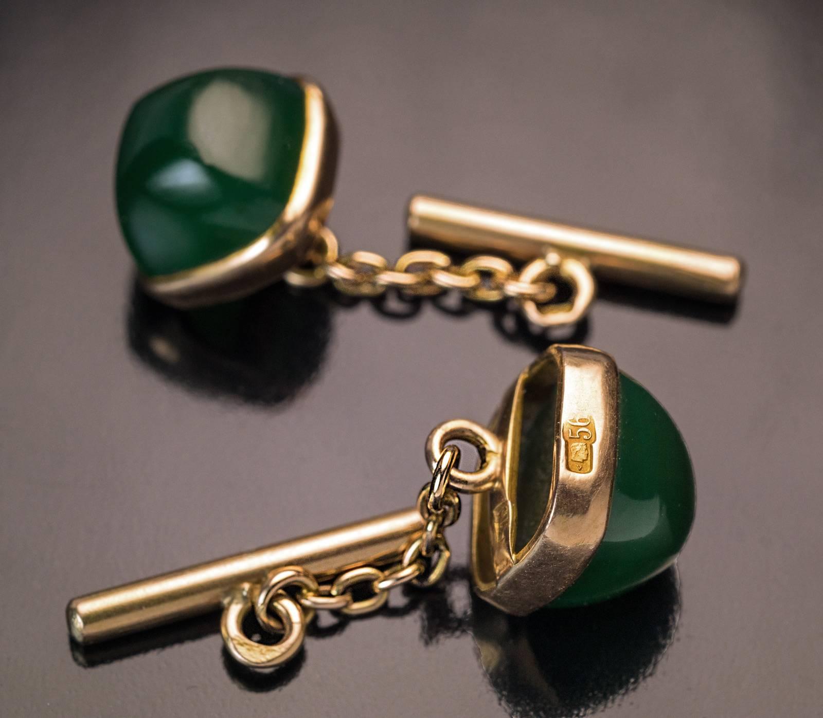 Made in Kiev between 1908 and 1917
14K gold cufflinks are set with sugarloaf cut Siberian nephrite jade of a deep green color. The cufflinks are marked with 56 zolotnik old Russian gold standard and maker’s initials ‘И Л’.

Width 12 mm (7/16 in.)
