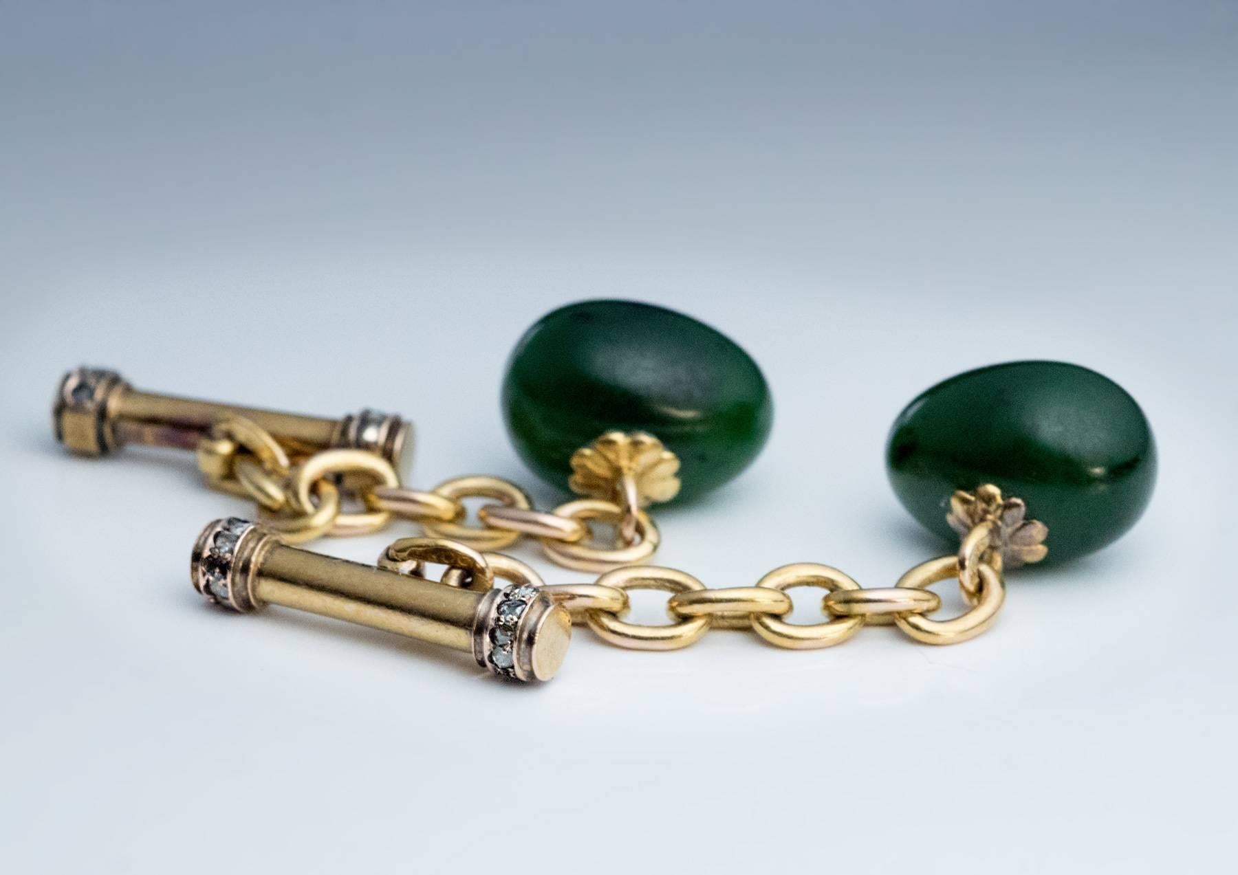 Made in St. Petersburg between 1899 and 1901.
A pair of rare pre-1917  Carl Faberge egg-shaped carved nephrite jade, gold and rose cut diamond cufflinks. The cufflinks are marked with 56 zolotnik old Russian gold standard (14K) with initials ‘ЯЛ’ of