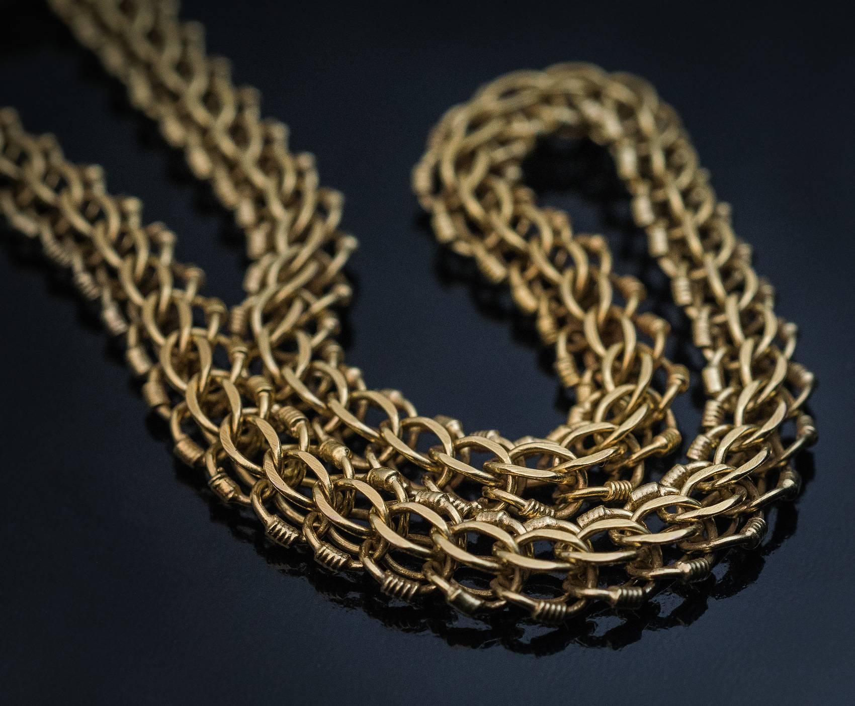 This fine and heavy woven gold necklace was made in Moscow between 1908 and 1917. It is marked with 56 zolotnik (14K) Imperial gold standard, maker’s mark, and later Soviet control mark for 583 gold standard from the 1930s.
Length 205 cm (80.7