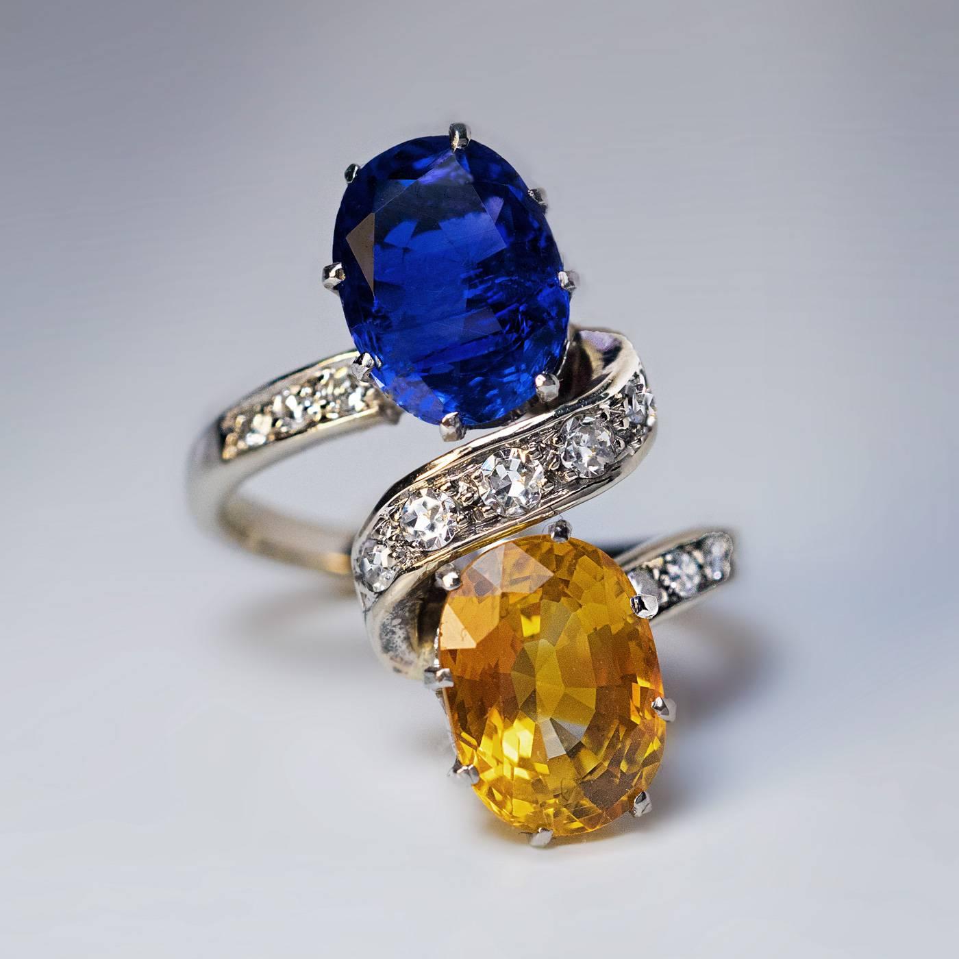 blue and orange engagement rings