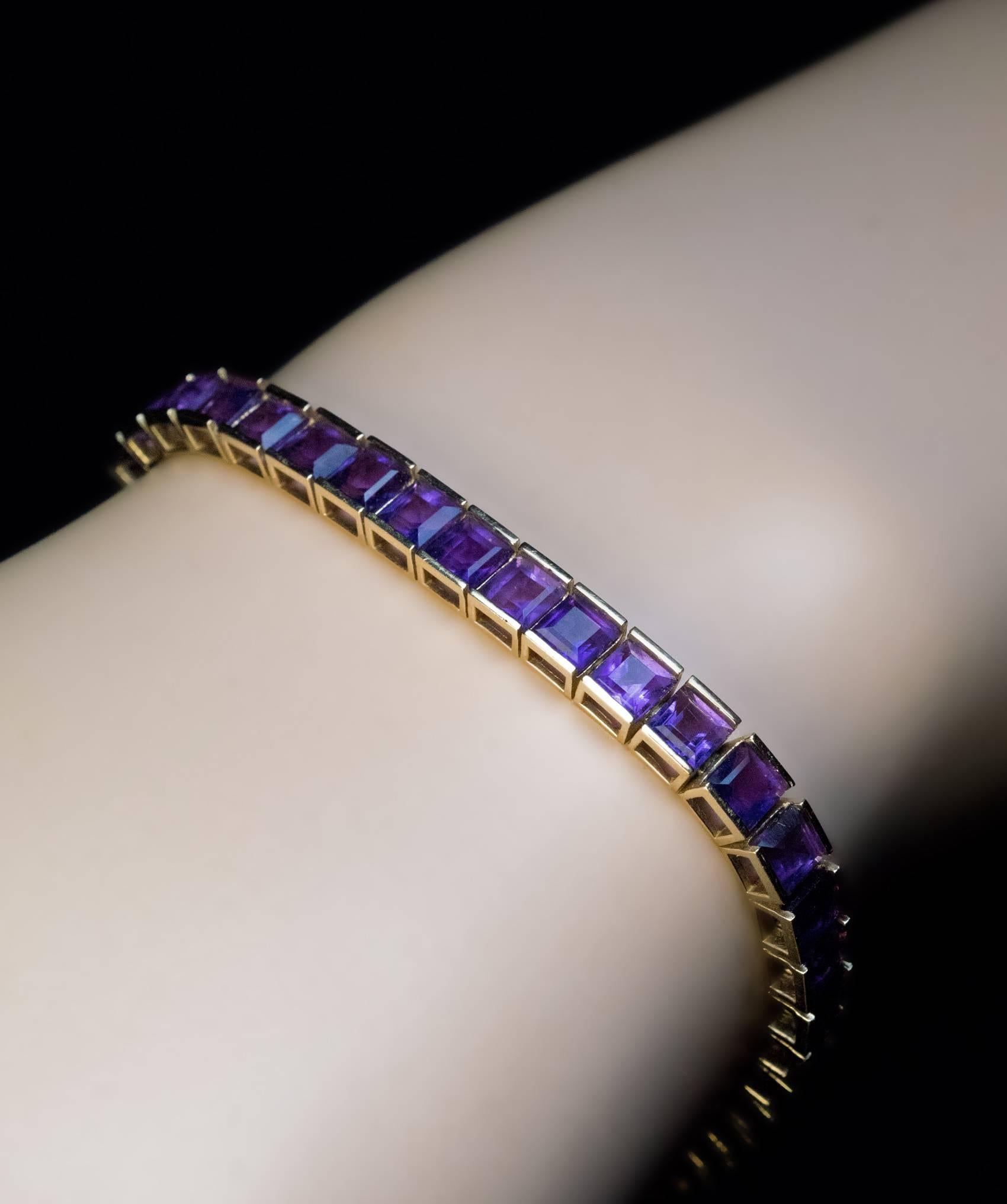 A contemporary amethyst and 14K gold line bracelet is set with well matched lavender purple step-cut square amethysts.

Length 18.8 cm (7 1/2 in.)

Weight 14.13 grams