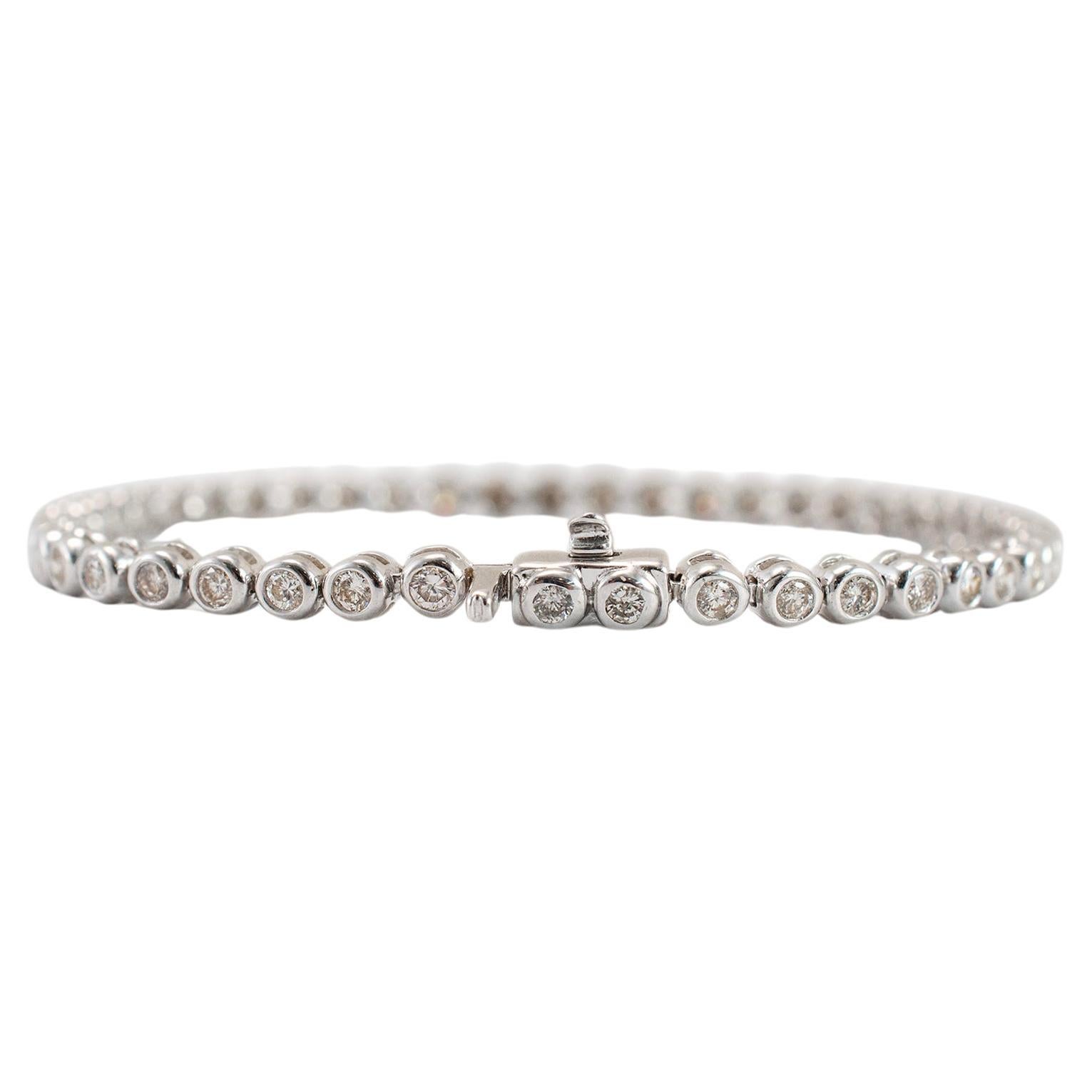 Bracelet tennis en or blanc 14 carats serti d'un diamant de 1,94 carat