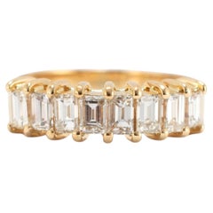 Bague demi-éternité en or jaune 18 carats, sertie d'un diamant taille baguette de 0,58 carat