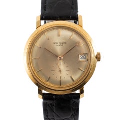 Montre vintage Patek Philippe Calatrava 35 mm 3445, cadran saphir, or jaune 18 carats