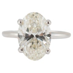Anillo de compromiso solitario de oro blanco de 14 quilates con un diamante natural de talla ovalada de 3,02 ct certificado por la GIA