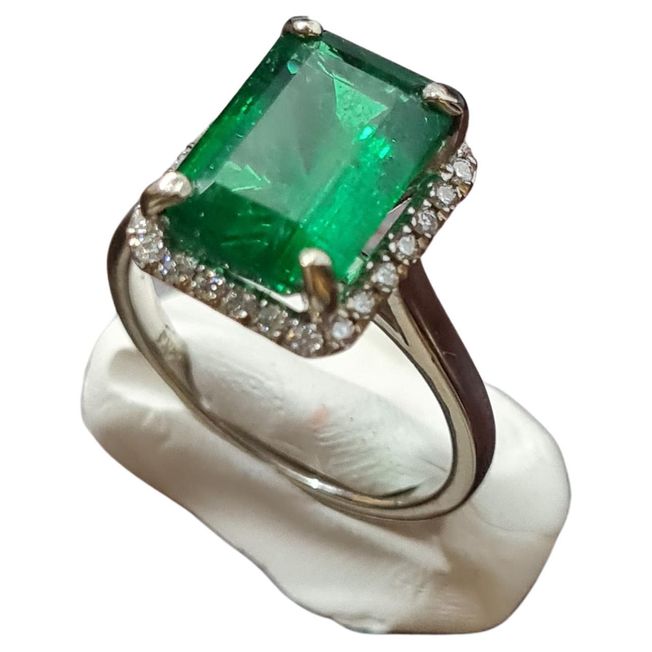 Modern GIA Certified 4.54 CT Zambian Emerald Ring For Sale