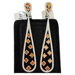 Orecchini con diamanti arancioni fantasia Peso totale in carati 4,69 ct in oro bianco