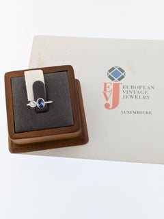 Anello di fidanzamento tedesco certificato IGI in oro bianco 14 carati con tanzanite e diamanti