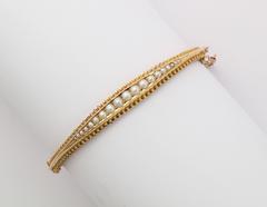 An Edwardian Gold Natural Pearl Bracelet