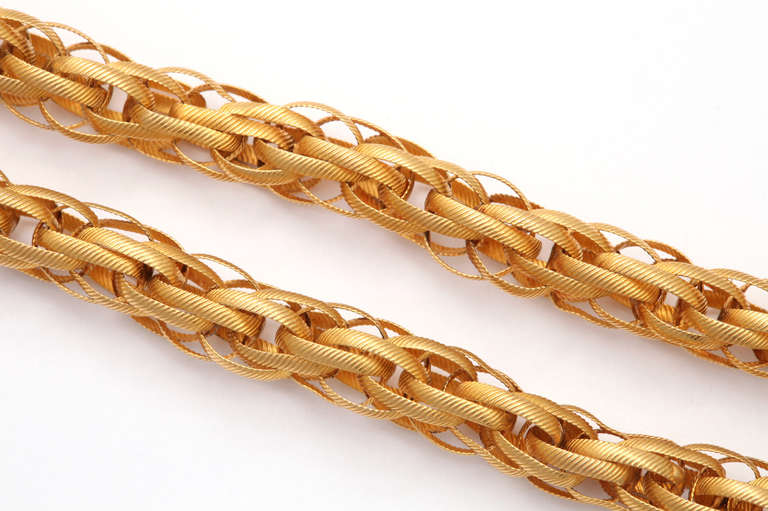 Enlarging is a must! Beautiful as all Georgian chains are, we were thrilled to see the braided, entwined tightness and sturdiness of these 15kt gold textured links. Long chains were worn by men and women. Often worn dropping to the waist, doubled,