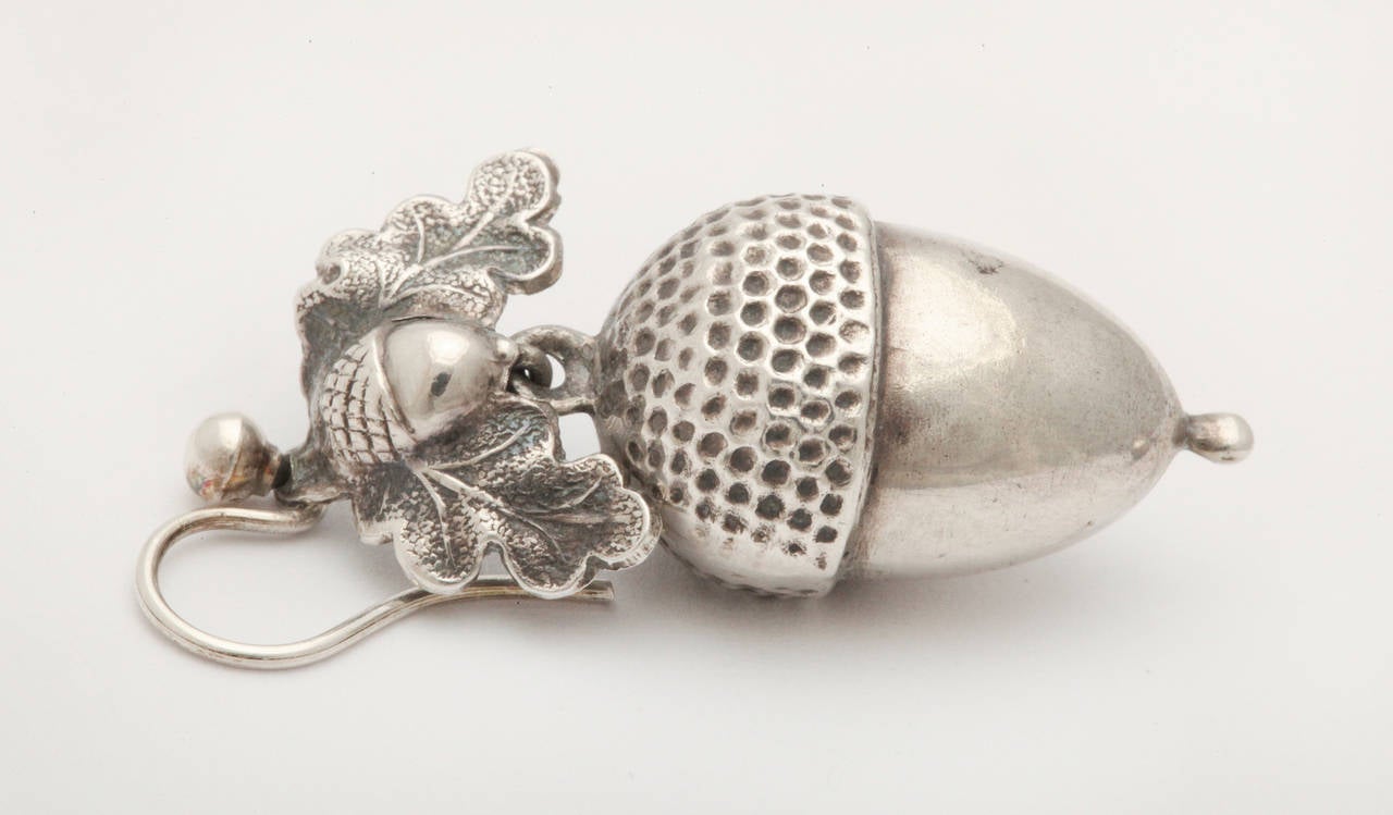 Victorian silver acorn earrings have always had high demand for their realistic form and engraving. The earrings are light on the ear being hollow and good for the heart, bringing with them their legend of rebirth and fertility. Easy to wear.  Quick