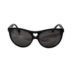 Moschino - Grandes lunettes de soleil en lucite noire « Love »