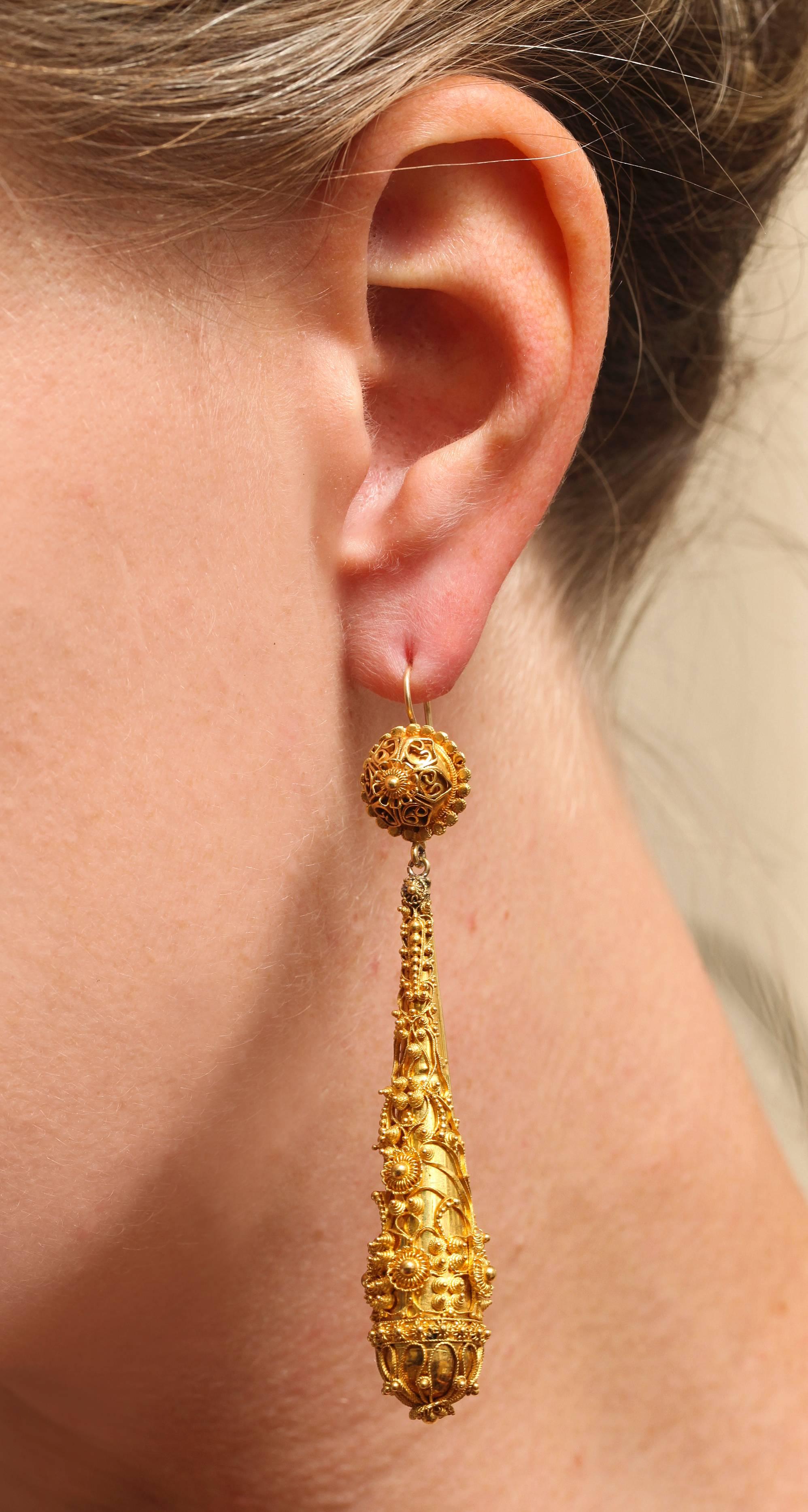 Admirable hand work was dedicated to the construction of these gold encrusted Georgian earrings witnessed by  granulation, cannetille, ropes, flowers, loops and coils.  The jeweler went all out as did my passion for beauty when I found these