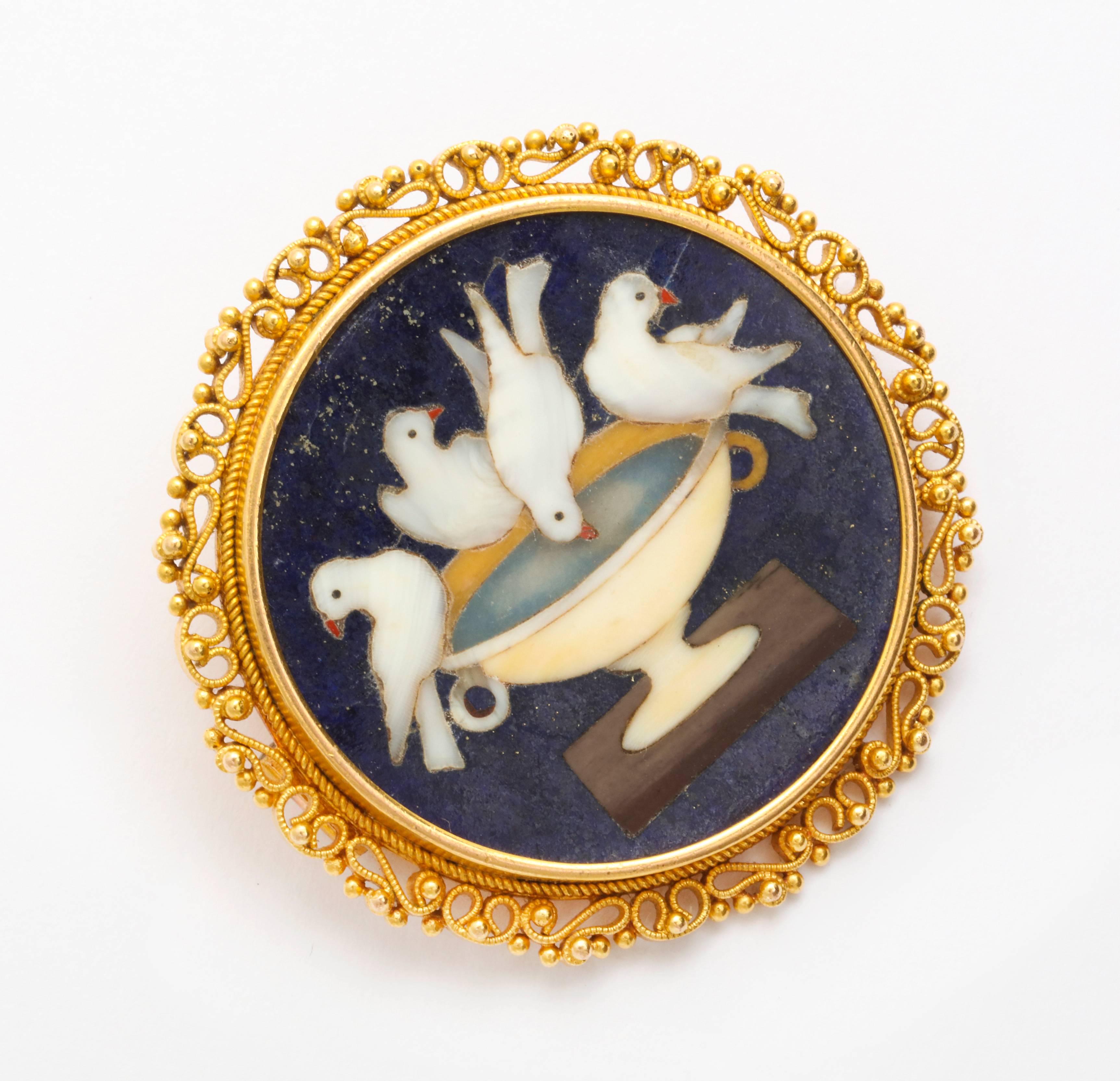 Run your finger over this brooch of the finest pietra dura mosaic imaginable and you will not feel the various stones as the artist was a genius. Take in the size of the eyes and dove beaks and the oh so subtle color gradations that make the birds