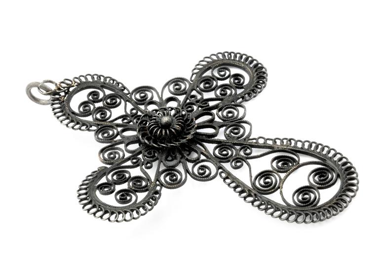 In this large cross, the strength of Iron and fine gossamer swirls combine to create et another miracle of historic Berlin Iron work from the early 1800's. There are four layers of iron here forged together with focus on the central flower. What
