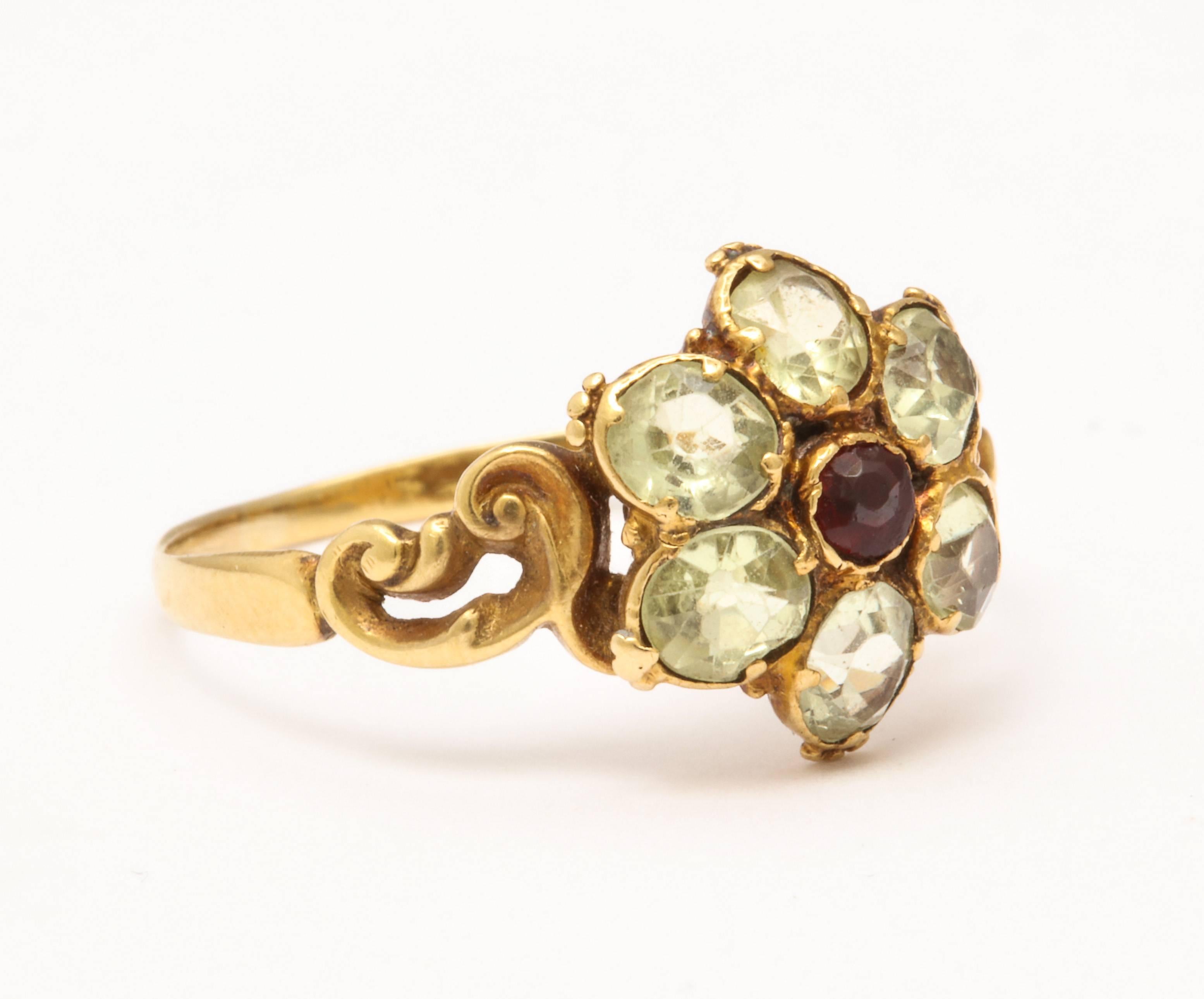 Regency Chrysolite Flower and Scroll Ring In Excellent Condition For Sale In Stamford, CT