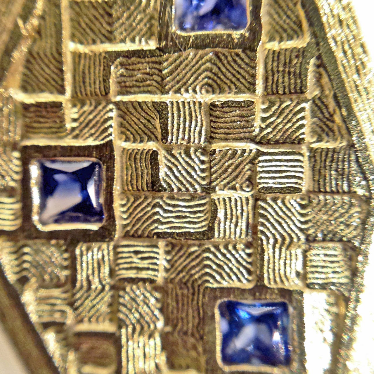 One-of-a-Kind Princess-Cut Cornflower Blue Sapphire Earrings in 18k yellow gold.  Made with a 3D Printer, the 18k gold has an incredibly detailed texture that captures light in a mystical, otherworldly way. Please call or email us for a video to