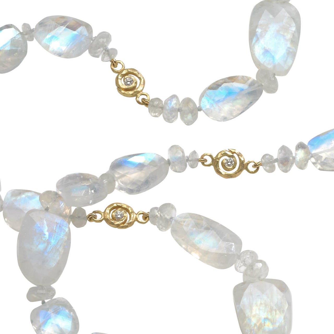 One-of-a-Kind Lustrous Moonstone Necklace handcrafted with rainbow moonstone beads exhibiting primarily blue and white sheen. Moonstones are accented with six 18k yellow gold, diamond-embedded stations (0.60tcw) and an 18k yellow gold scroll