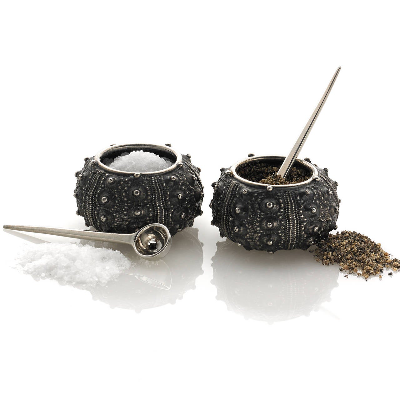 Sea Urchin Salt and Pepper Cellars handcrafted in oxidized sterling silver with bright sterling silver accents and bright sterling silver spoons.