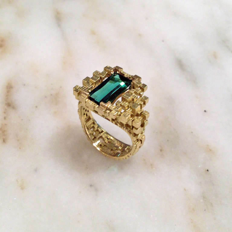 One-of-a-Kind Ring in 18k yellow gold with a beautiful sea green tourmaline. Gold has incredible optical effect as it reflects light off of small ridges on each pixel. Mesmerizing. Size 6.75.