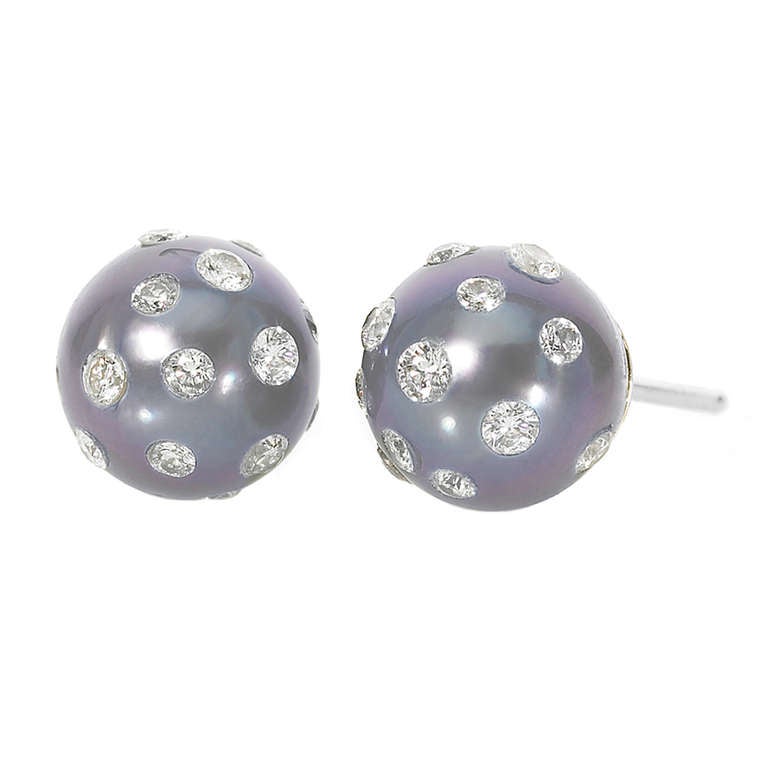 One-of-a-Kind Earrings in 18k white gold with incredibly rare bluish-violet Tahitian pearls with embedded-diamonds (0.65tcw).
