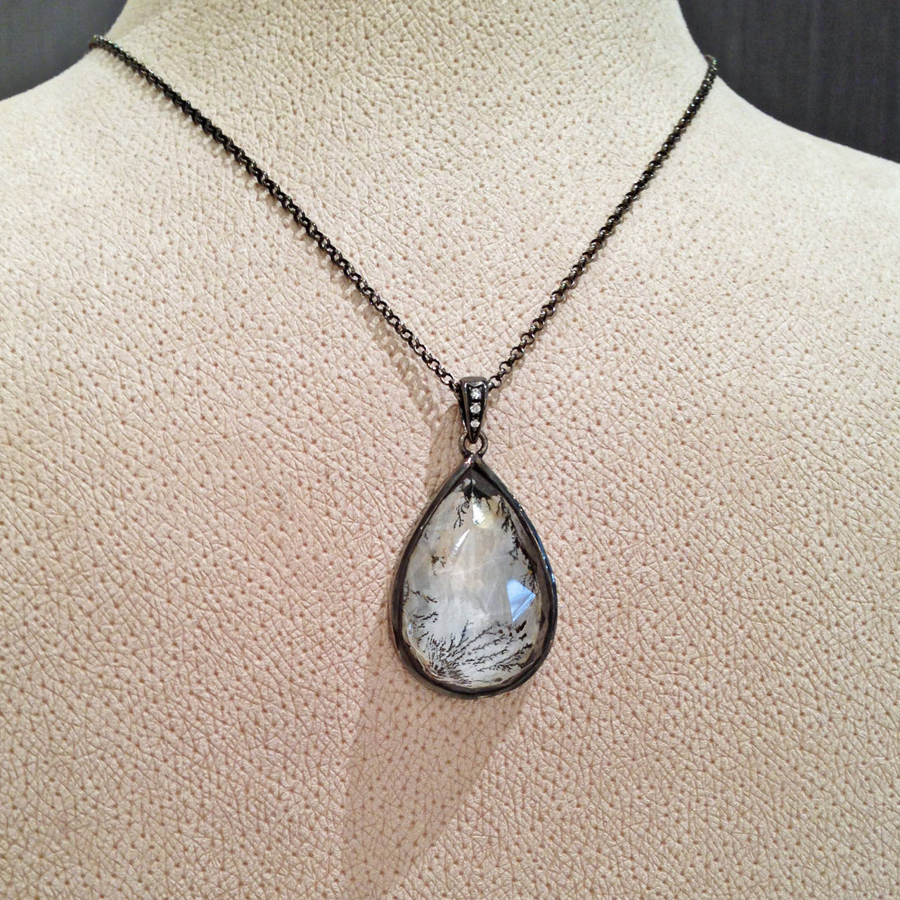One-of-a-Kind Necklace handcrafted in oxidized sterling silver with a 43.75 carat faceted, three-dimensional dendritic agate and accented with three round, white, brilliant-cut diamonds set in an oxidized sterling silver bail.