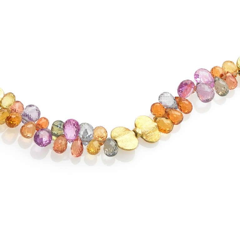 One-of-a-Kind Multicolored Sapphire (24.24cts) Bracelet with 18k yellow gold wing spacers. 

About the Artist: Barbara Heinrich derives great spiritual satisfaction from her work. Her creations are just as much gifts to me as they are gifts to