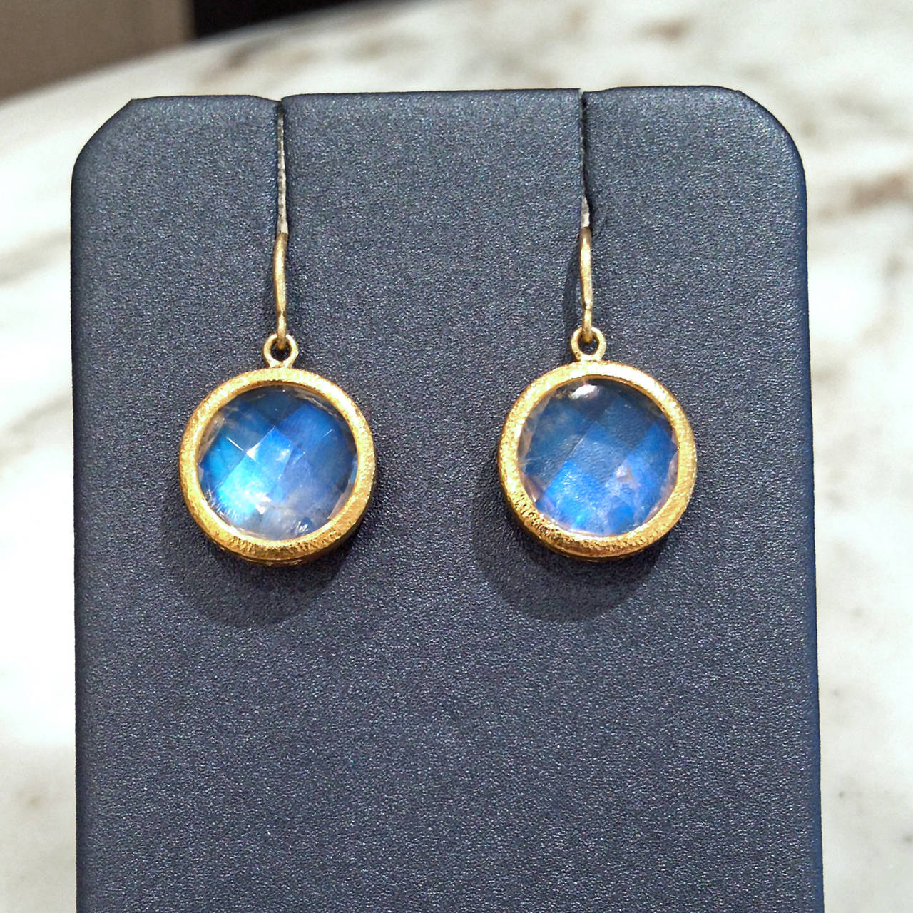 One of a Kind Earrings handcrafted in 22k yellow gold with two phenomenal round checker-cut blue moonstones.
