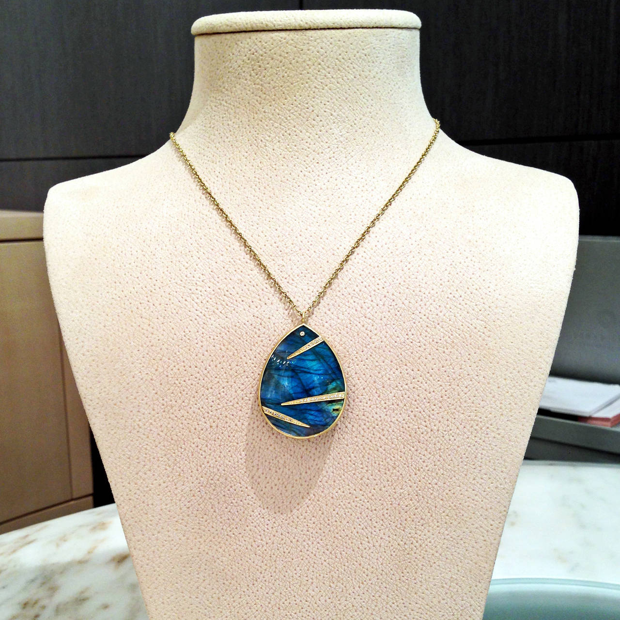 One-of-a-Kind Bamboo Necklace handcrafted in 18k yellow gold with a stunning, vibrant labradorite prong-set and bezel-set with white round brilliant-cut diamonds. Labradorite primarily blue with flashes of green, orange, yellow, and red. Can be worn