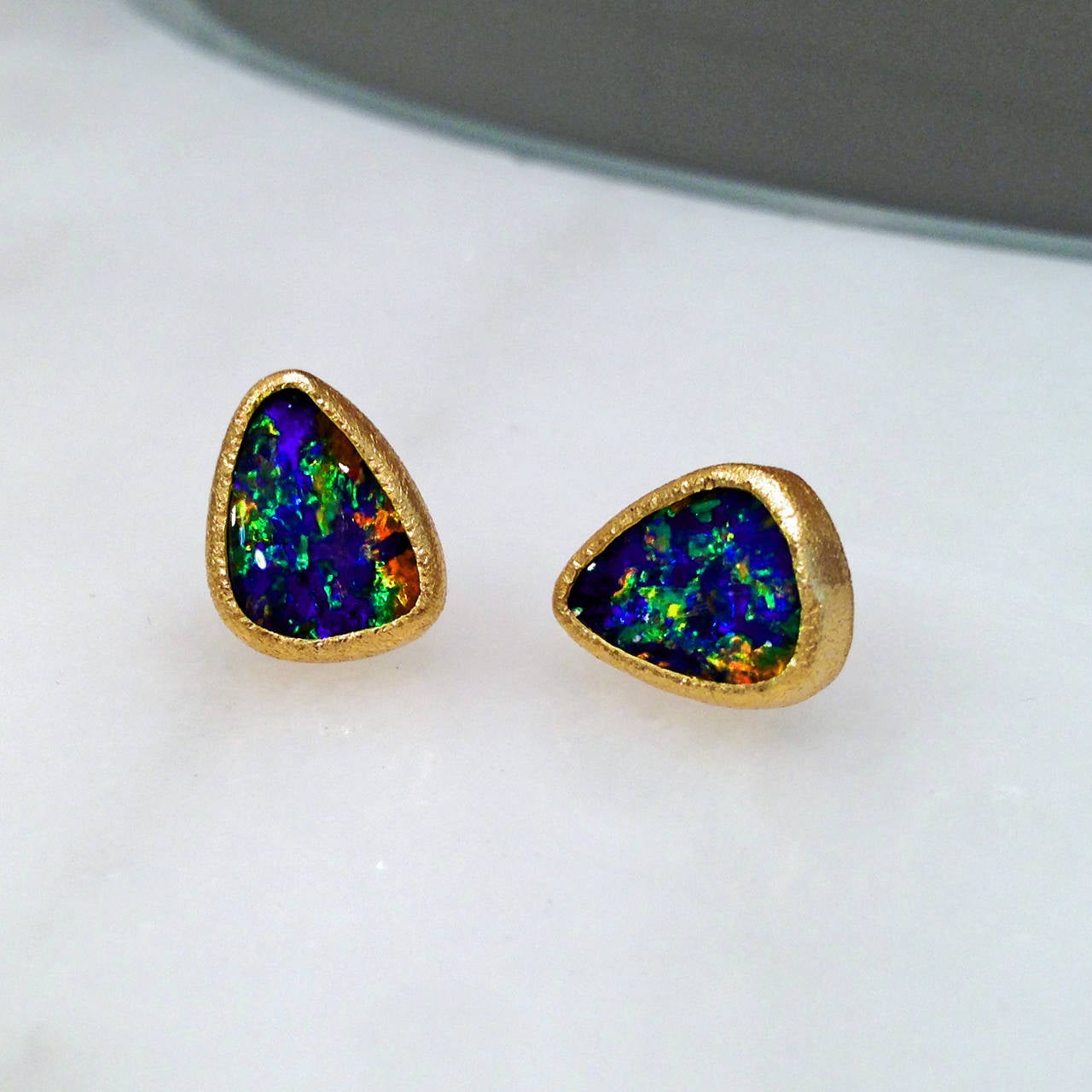 One of a Kind Earrings handcrafted in 22k yellow gold with exceptional, fiery opal doublets displaying electrifying flashes of red, orange, yellow, green, blue and purple. Truly extraordinary intensity!