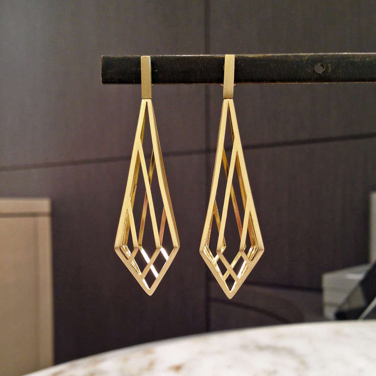 cage earrings gold