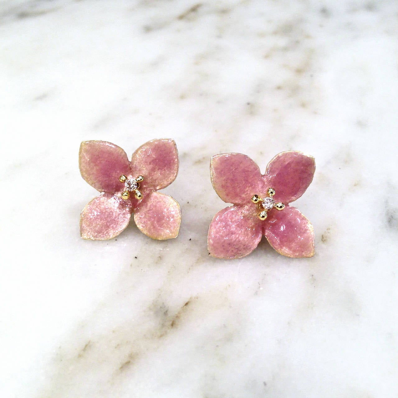 Blossom Earrings handcrafted with kiln-fired pink enamel petals accented by 0.10 total carats of white diamonds set in 18k yellow gold on 18k yellow gold posts.