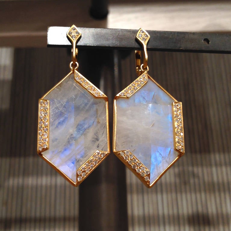 Golden Hexagon Earrings handcrafted in matte-finished 18k yellow gold by jewelry artist Lauren Harper with two faceted rainbow moonstones surrounded by 0.49 carats of round brilliant-cut white diamonds.

